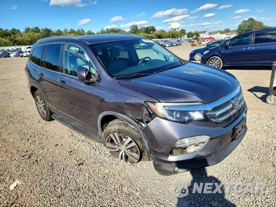Czwarte zdjęcie samochodu z boku: 2018 HONDA PILOT EXLN VIN:5FNYF6H74JB070786 - miniatura