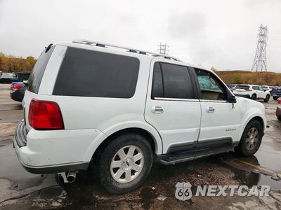 Trzecie zdjęcie samochodu z tyłu: 2003 LINCOLN NAVIGATOR VIN:5LMFU27R33LJ01012 - miniatura