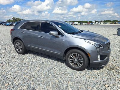 Czwarte zdjęcie samochodu z boku: 2021 CADILLAC XT5 PREMIUM LUXURY VIN:1GYKNDRS1MZ103056 - miniatura