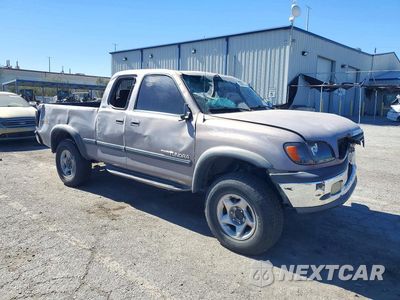Czwarte zdjęcie samochodu z boku: 2000 TOYOTA TUNDRA SR5 VIN:5TBBT441XYS090463 - miniatura