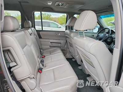Zdjęcie 11 z 13 samochodu: 2009 HONDA PILOT EXL VIN:5FNYF48689B039368 - miniatura