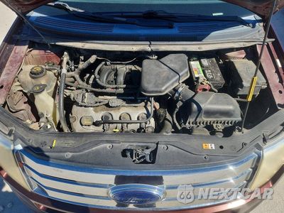 Zdjęcie 12 z 13 samochodu: 2009 FORD EDGE SEL VIN:2FMDK38C49BA87159 - miniatura