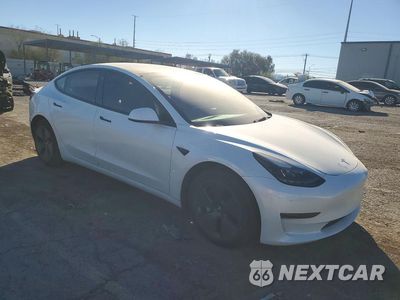 Czwarte zdjęcie samochodu z boku: 2023 TESLA MODEL 3 VIN:5YJ3E1EA4PF418319 - miniatura