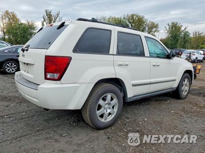 Trzecie zdjęcie samochodu z tyłu: 2010 JEEP GRAND CHEROKEE LAREDO VIN:1J4PR4GK2AC146106 - miniatura