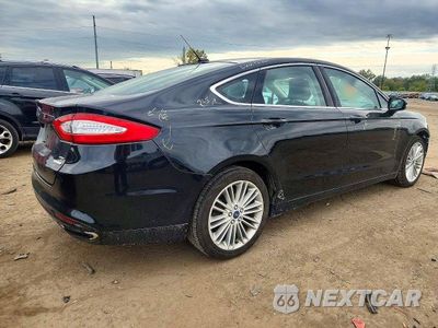 Trzecie zdjęcie samochodu z tyłu: 2016 FORD FUSION SE VIN:3FA6P0T96GR392711 - miniatura