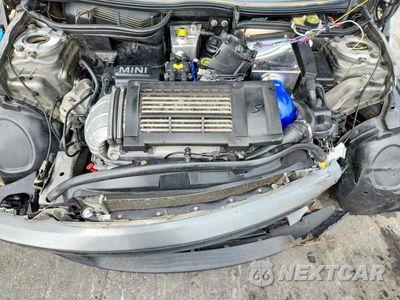 Zdjęcie 11 z 12 samochodu: 2004 MINI COOPER S VIN:WMWRE33414TD82178 - miniatura