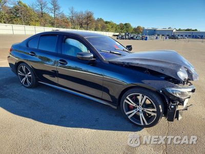 Czwarte zdjęcie samochodu z boku: 2022 BMW M340XI VIN:3MW5U9J01N8C58017 - miniatura