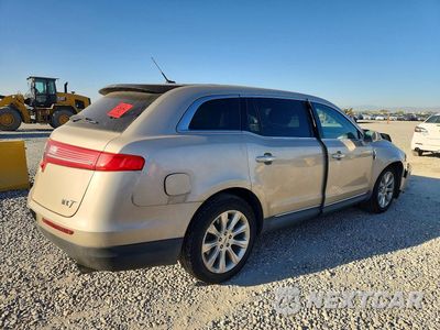 Trzecie zdjęcie samochodu z tyłu: 2017 LINCOLN MKT VIN:2LMHJ5AT8HBL00613 - miniatura