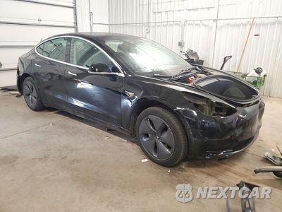 Czwarte zdjęcie samochodu z boku: 2020 TESLA MODEL 3 VIN:5YJ3E1EA0LF606409 - miniatura