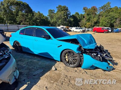 Czwarte zdjęcie samochodu z boku: 2018 BMW M5 VIN:WBSJF0C54JB283186 - miniatura