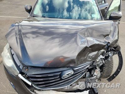 Zdjęcie 12 z 13 samochodu: 2016 MAZDA CX-5 TOURING VIN:JM3KE4CYXG0831364 - miniatura