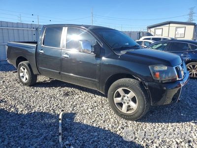 Czwarte zdjęcie samochodu z boku: 2005 NISSAN TITAN XE VIN:1N6AA07A05N542996 - miniatura