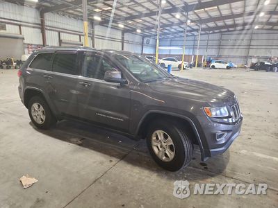Czwarte zdjęcie samochodu z boku: 2016 JEEP GRAND CHEROKEE LAREDO VIN:1C4RJFAG0GC435774 - miniatura