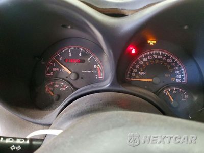 Zdjęcie 9 z 12 samochodu: 2003 PONTIAC GRAND AM GT VIN:1G2NW12E63C327139 - miniatura