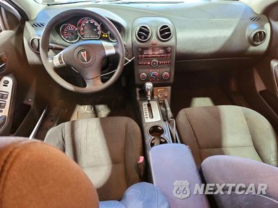 Zdjęcie 8 z 12 samochodu: 2009 PONTIAC G6 VIN:1G2ZJ57B794274539 - miniatura