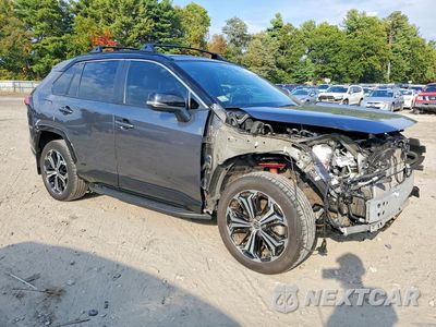 Czwarte zdjęcie samochodu z boku: 2023 TOYOTA RAV4 PRIME XSE VIN:JTMFB3FV5PD114457 - miniatura