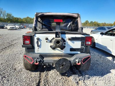 Zdjęcie 6 z 12 samochodu: 2016 JEEP WRANGLER UNLIMITED SAHARA VIN:1C4BJWEG0GL103765 - miniatura