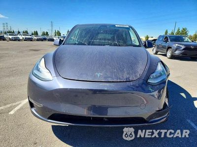 Piąte zdjęcie samochodu w środku: 2021 TESLA MODEL Y VIN:5YJYGDED2MF124392 - miniatura