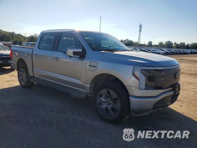 Czwarte zdjęcie samochodu z boku: 2023 FORD F150 LIGHTNING PRO VIN:1FTVW1EV6PWG06523 - miniatura
