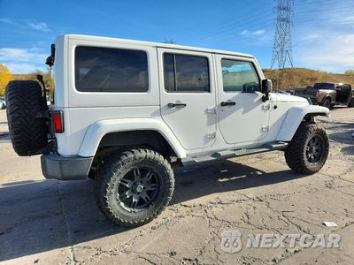 Trzecie zdjęcie samochodu z tyłu: 2012 JEEP WRANGLER UNLIMITED SAHARA VIN:1C4BJWEG6CL205341 - miniatura