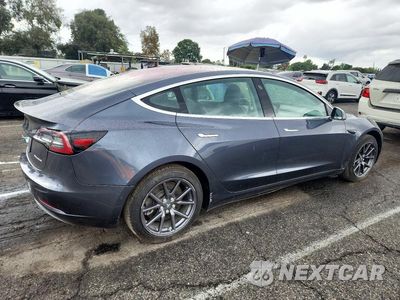 Trzecie zdjęcie samochodu z tyłu: 2018 TESLA MODEL 3 VIN:5YJ3E1EBXJF130790 - miniatura