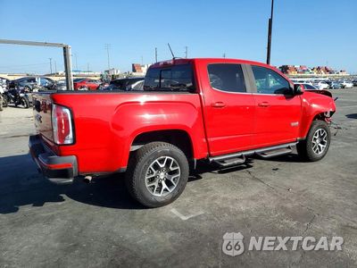 Trzecie zdjęcie samochodu z tyłu: 2016 GMC CANYON SLE VIN:1GTG5CE34G1386575 - miniatura