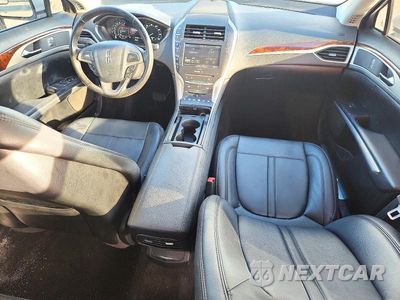 Zdjęcie 8 z 12 samochodu: 2016 LINCOLN MKZ VIN:3LN6L2G92GR615186 - miniatura