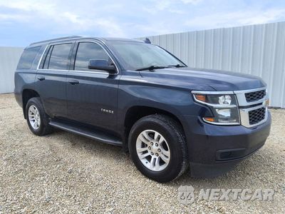 Czwarte zdjęcie samochodu z boku: 2019 CHEVROLET TAHOE C1500 LS VIN:1GNSCAKC0KR114969 - miniatura