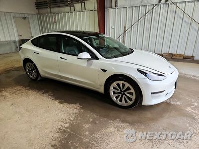Czwarte zdjęcie samochodu z boku: 2023 TESLA MODEL 3 VIN:5YJ3E1EA4PF435248 - miniatura