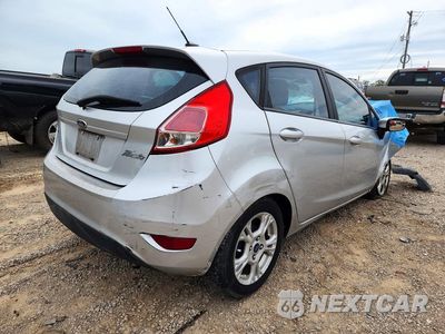 Trzecie zdjęcie samochodu z tyłu: 2016 FORD FIESTA SE VIN:3FADP4EJ2GM173313 - miniatura