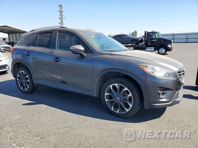 Czwarte zdjęcie samochodu z boku: 2016 MAZDA CX-5 GT VIN:JM3KE4DY2G0838808 - miniatura