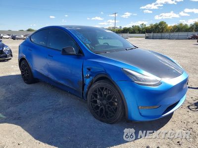 Czwarte zdjęcie samochodu z boku: 2022 TESLA MODEL Y VIN:7SAYGDEE7NF431389 - miniatura