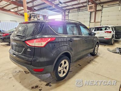 Trzecie zdjęcie samochodu z tyłu: 2014 FORD ESCAPE SE VIN:1FMCU9GX3EUD69519 - miniatura