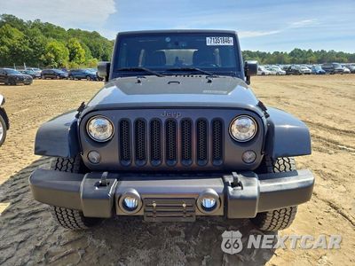 Piąte zdjęcie samochodu w środku: 2017 JEEP WRANGLER UNLIMITED SPORT VIN:1C4BJWDG4HL563255 - miniatura