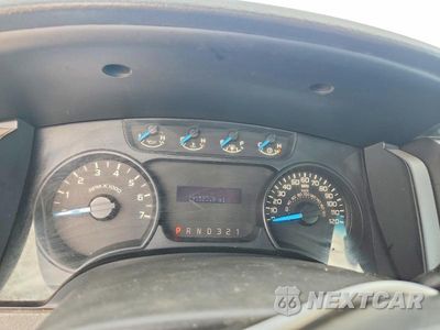 Zdjęcie 9 z 12 samochodu: 2014 FORD F150 VIN:1FTMF1EM1EKD68491 - miniatura