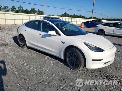 Czwarte zdjęcie samochodu z boku: 2018 TESLA MODEL 3 VIN:5YJ3E1EA4JF038811 - miniatura