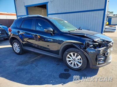 Czwarte zdjęcie samochodu z boku: 2016 MAZDA CX-5 SPORT VIN:JM3KE2BY6G0786705 - miniatura