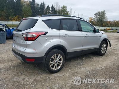 Trzecie zdjęcie samochodu z tyłu: 2018 FORD ESCAPE SEL VIN:1FMCU9HD7JUD53838 - miniatura