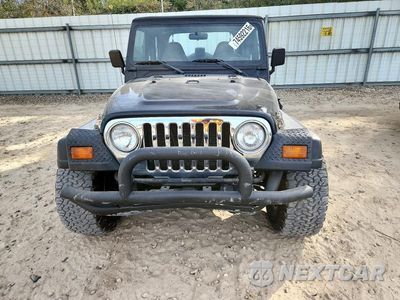 Piąte zdjęcie samochodu w środku: 1999 JEEP WRANGLER / TJ SPORT VIN:1J4FY19S4XP401575 - miniatura