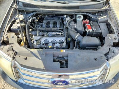 Zdjęcie 12 z 13 samochodu: 2008 FORD TAURUS X SEL VIN:1FMDK02W28GA01906 - miniatura