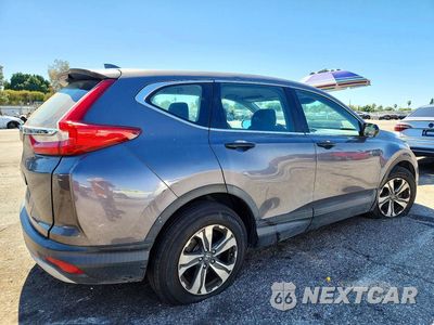 Trzecie zdjęcie samochodu z tyłu: 2018 HONDA CR-V LX VIN:2HKRW5H32JH424110 - miniatura
