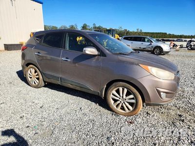 Czwarte zdjęcie samochodu z boku: 2011 HYUNDAI TUCSON LIMITED VIN:KM8JUCAC6BU203887 - miniatura
