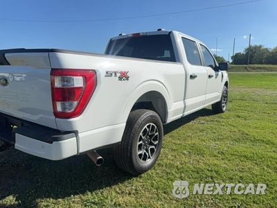 Czwarte zdjęcie samochodu z boku: 2023 FORD F150 SUPERCREW VIN:1FTFW1E51PKD13592 - miniatura