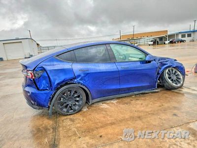 Trzecie zdjęcie samochodu z tyłu: 2021 TESLA MODEL Y VIN:5YJYGDEEXMF199415 - miniatura