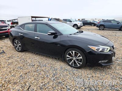 Czwarte zdjęcie samochodu z boku: 2017 NISSAN MAXIMA 3.5 SL VIN:1N4AA6AP2HC447767 - miniatura