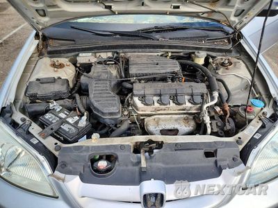 Zdjęcie 11 z 12 samochodu: 2001 HONDA CIVIC LX VIN:1HGEM22521L094768 - miniatura
