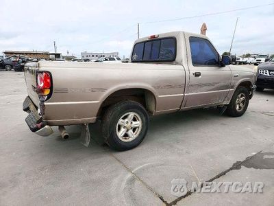 Trzecie zdjęcie samochodu z tyłu: 1996 MAZDA B2300 VIN:4F4CR12A8TTM43988 - miniatura