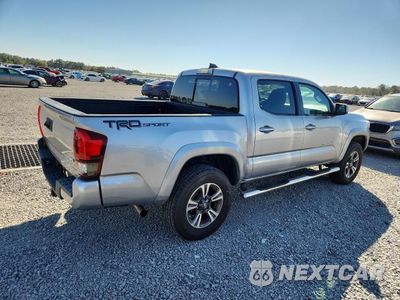 Trzecie zdjęcie samochodu z tyłu: 2019 TOYOTA TACOMA TRD SPORT VIN:3TMAZ5CN2KM102219 - miniatura