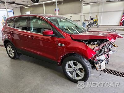 Czwarte zdjęcie samochodu z boku: 2014 FORD ESCAPE SE VIN:1FMCU9G92EUB01904 - miniatura
