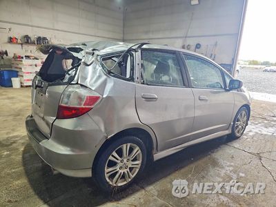Trzecie zdjęcie samochodu z tyłu: 2010 HONDA FIT SPORT VIN:JHMGE8H46AS015516 - miniatura